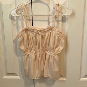 Never worn but tags were removed, bought in summer of 2021. Fits like a small.